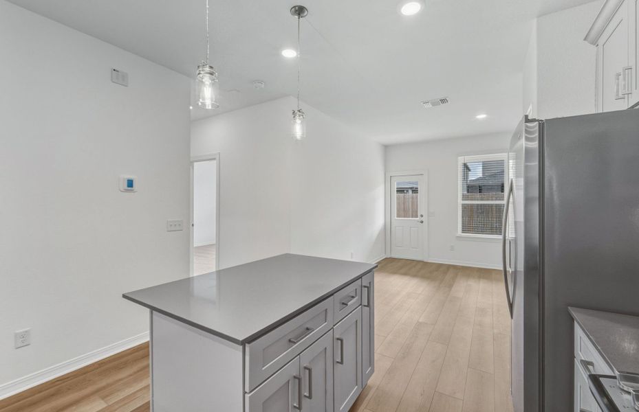 Furnished interior view inside a new home in Crosswinds, Kyle (Image 5).