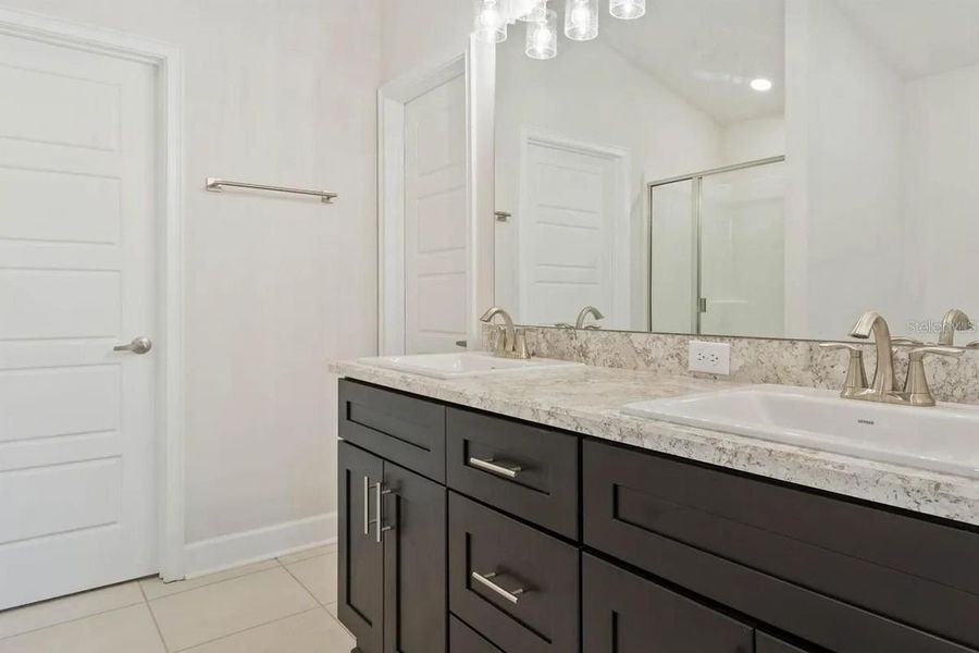 Representative furnished interior of a home built from the 1512 by Adams Homes in Winding Oaks, Weeki Wachee (Image 9).