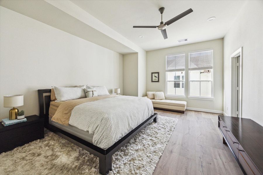 Primary Bedroom with Luxury Flooring Throughout