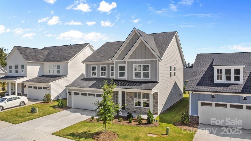 Front exterior of a new home in , Charlotte, NC, highlighting curb appeal (Image 17).