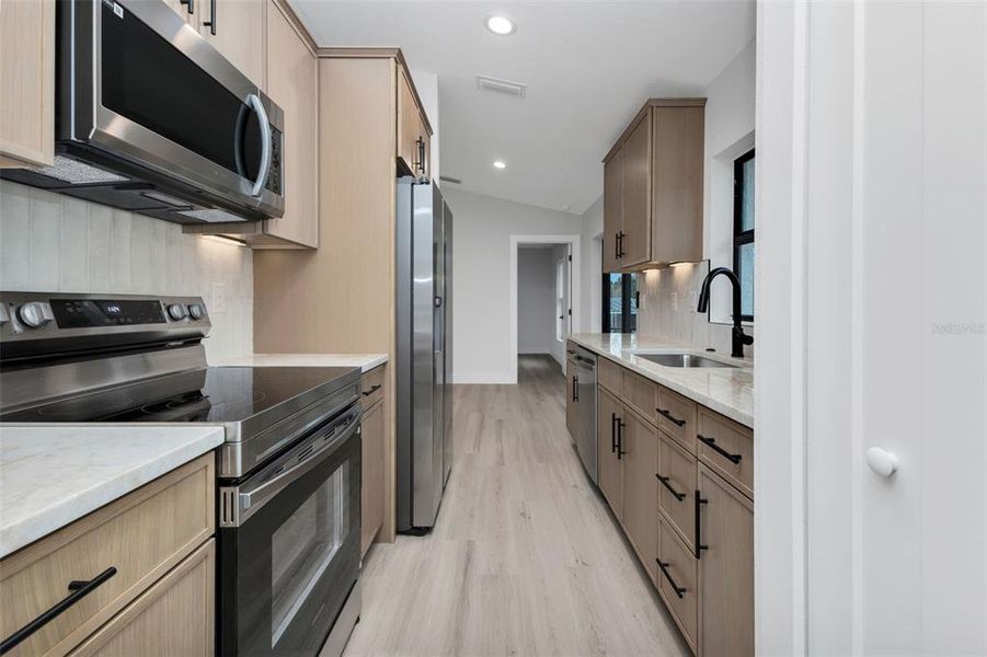 Furnished interior view inside a new home in , Punta Gorda (Image 9).