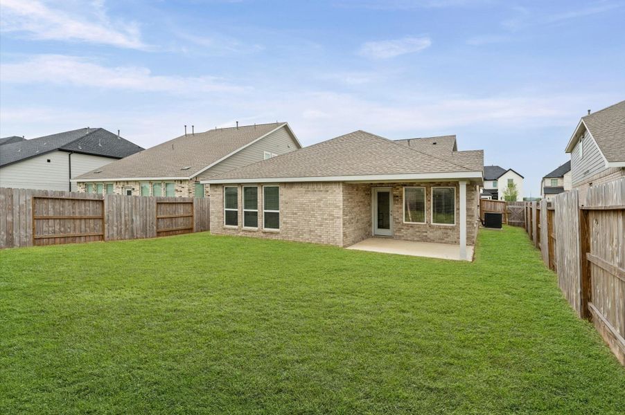 Large backyard with covered patio Large backyard with covered patio