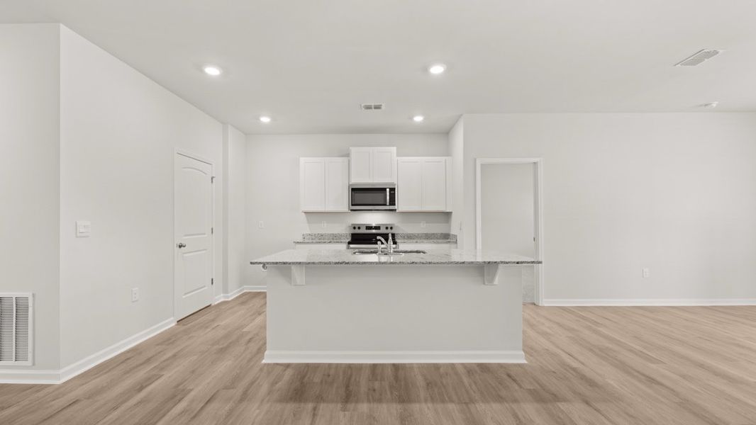 Representative furnished interior of a home built from the Aria by D.R. Horton in Oakleigh Glen, Dallas (Image 7).