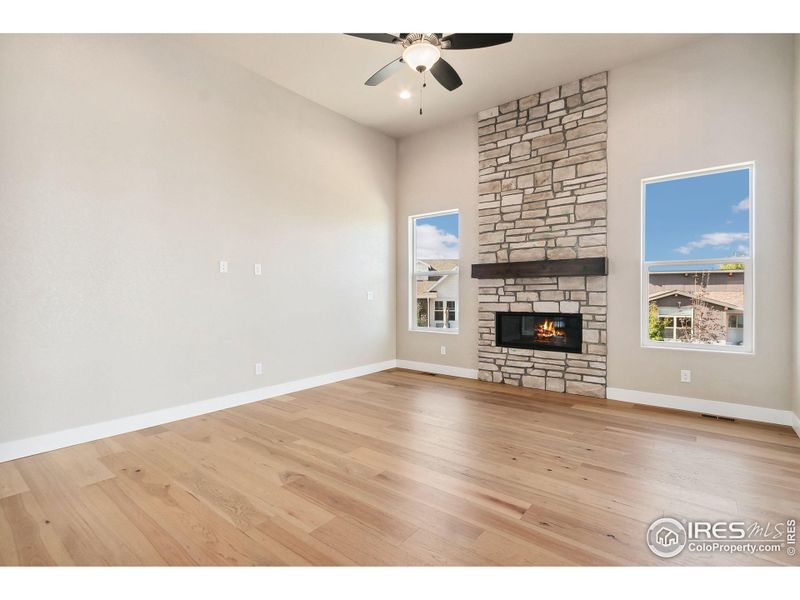 Linear Fireplace with Stone to Ceiling