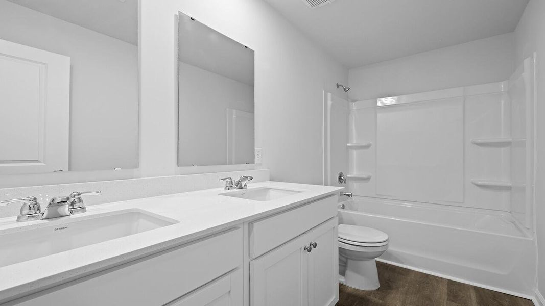 Furnished interior view inside a new home in Garbon Fields, Summerville (Image 13).