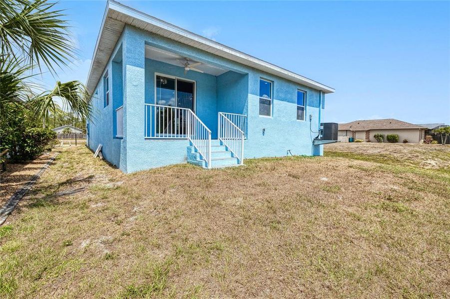 Front exterior of a new home in , Port Charlotte, FL, highlighting curb appeal (Image 23). Front exterior of a new home in , Port Charlotte, FL, highlighting curb appeal (Image 23).