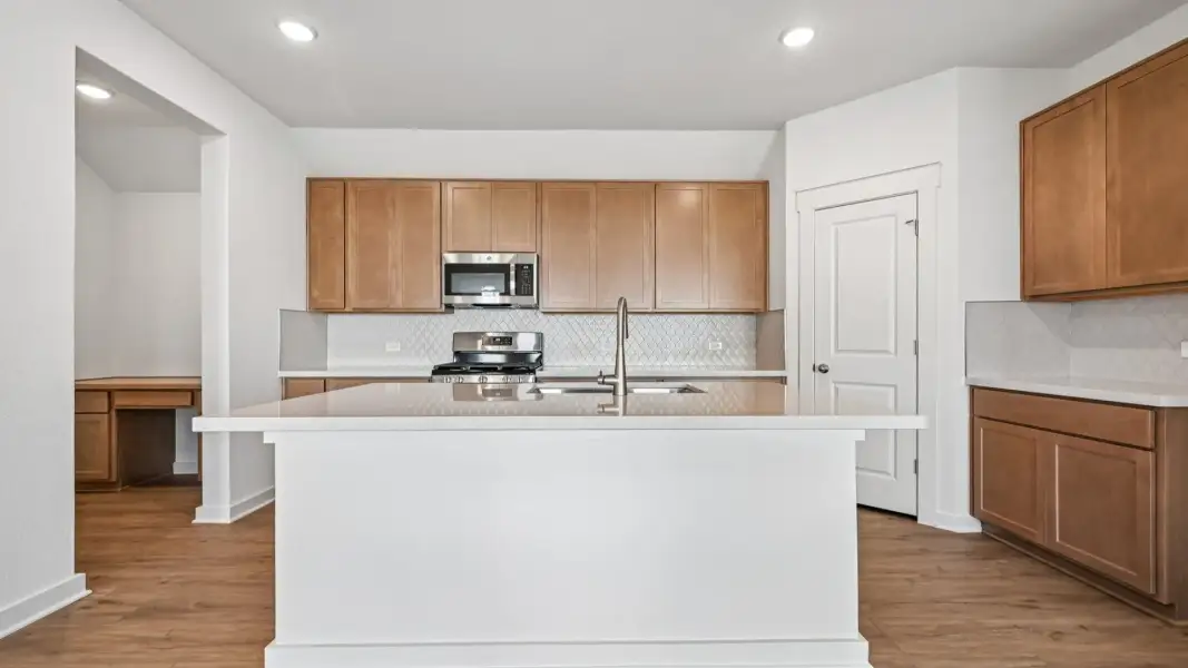 Furnished interior view inside a new home in Flora, Hutto (Image 15).