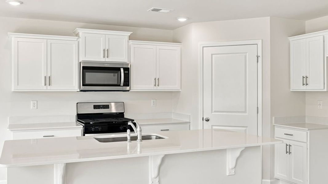 Furnished interior view inside a new home in Tyger Pines, Moore (Image 7).
