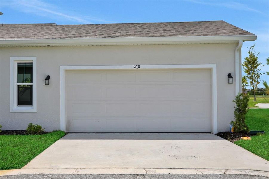 Exterior details and patio area of a home in Bungalow Walk at Lakewood Ranch, Sarasota (Image 3).