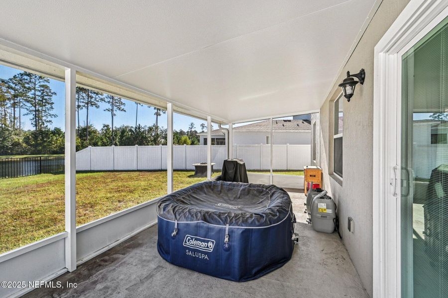 Exterior details and patio area of a home in Village Park, Green Cove Springs (Image 30).