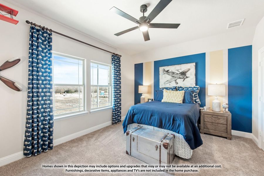 Bedroom with blue accent wall, ceiling fan, carpet, and large windows with patterned curtains Bedroom with blue accent wall, ceiling fan, carpet, and large windows with patterned curtains
