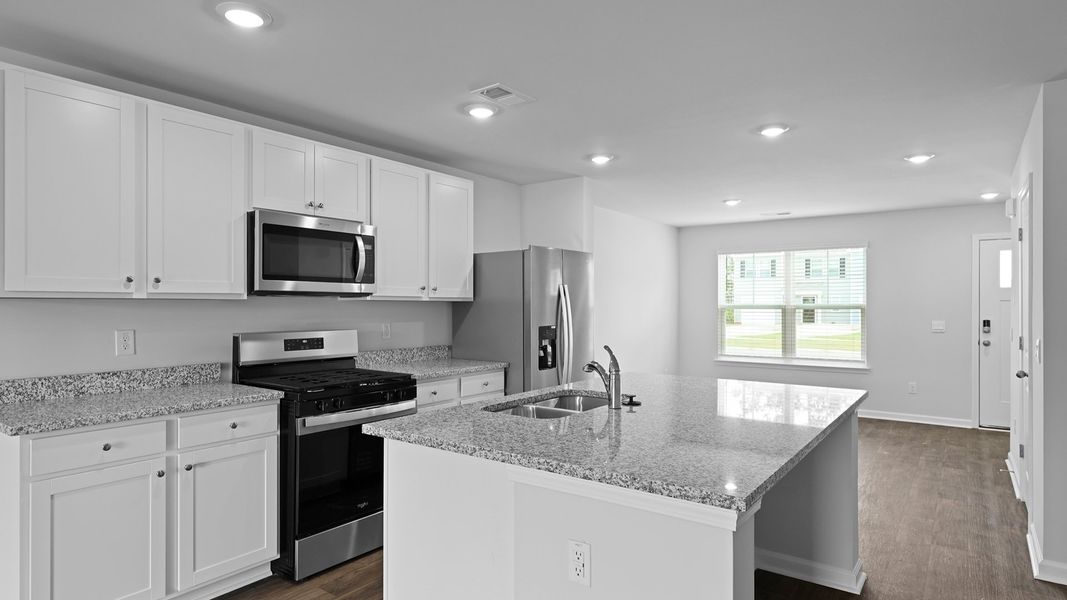 Representative furnished interior of a home built from the MURRAY TH by D.R. Horton in Pine Hills Townhomes at Cane Bay, Summerville (Image 5).