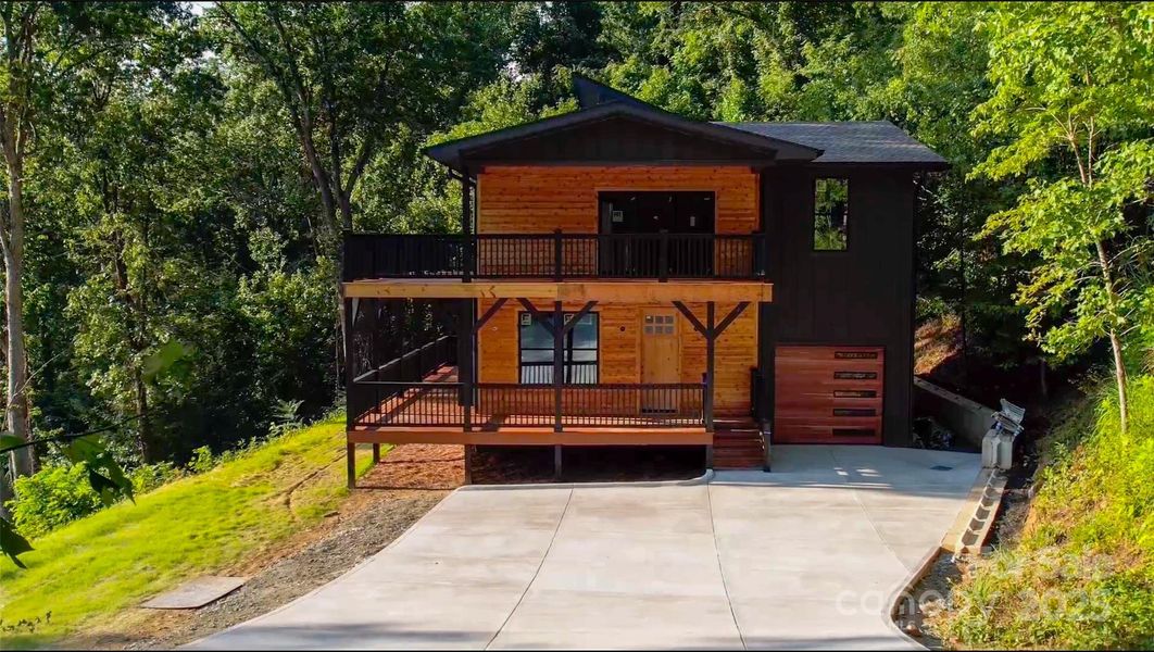 Front exterior of a new home in , Canton, NC, highlighting curb appeal (Image 1). Front exterior of a new home in , Canton, NC, highlighting curb appeal (Image 1).