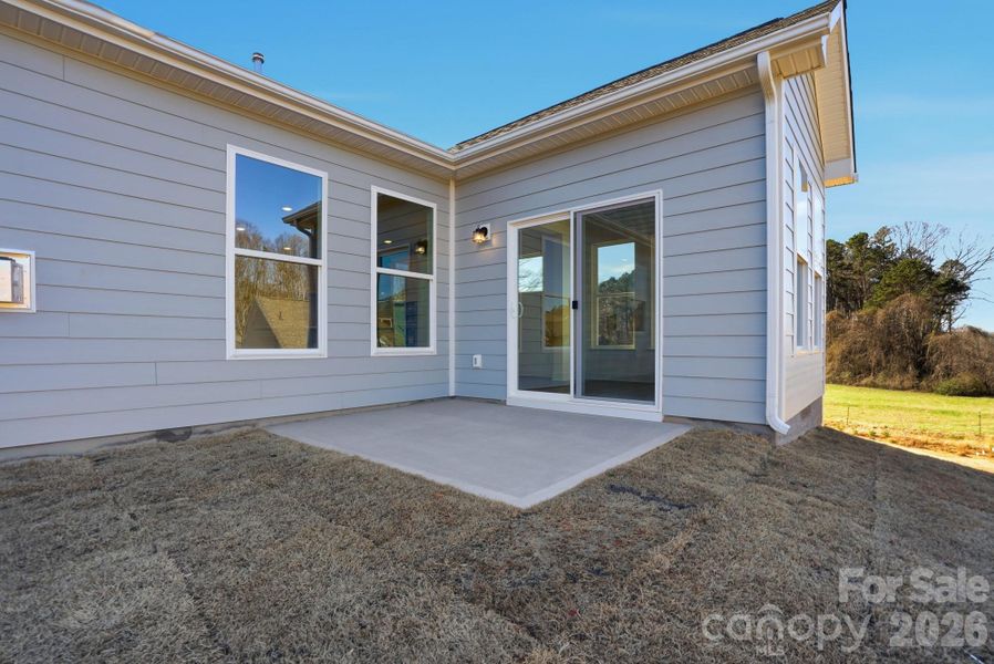 Exterior details and patio area of a home in Villas at Prestwick, Mooresville (Image 4).