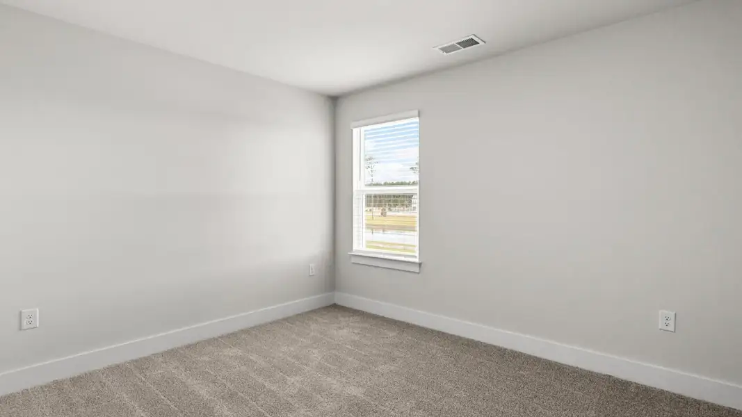 Representative unfurnished interior of a home built from the Wren by D.R. Horton in Saunders Village, Northwest (Image 28).