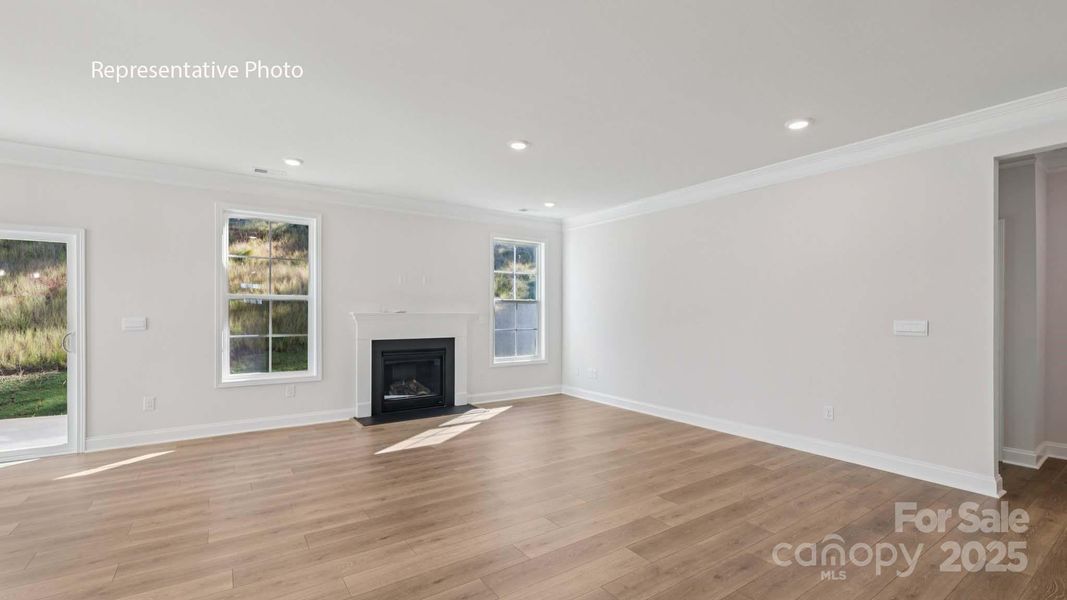 Spacious, unfurnished interior of a new home in Sanctuary at Southgate, Indian Trail (Image 11).