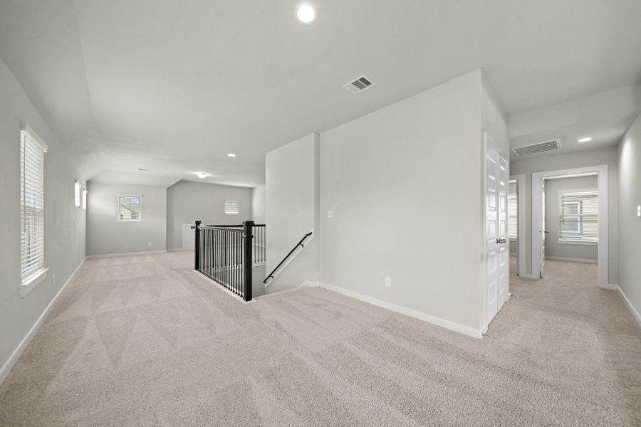 Spacious, unfurnished interior of a new home in Grand Oaks – The Cove, Houston (Image 22).
