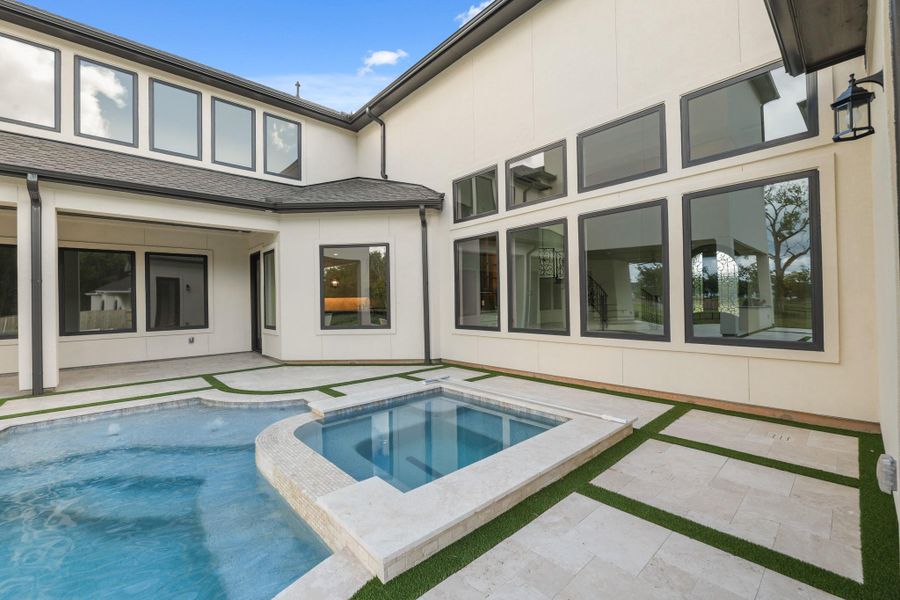 Exterior details and patio area of a home in The Park and The Reserve, Fulshear (Image 2).