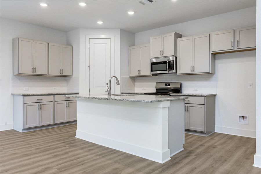 Lots of cabinets and storage.