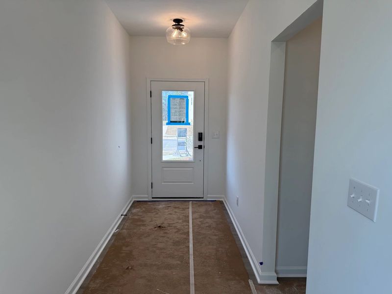 Foyer featuring the AW Collection® Artisan - A natural welcome with relaxed textures and grounded design. Foyer featuring the AW Collection® Artisan - A natural welcome with relaxed textures and grounded design.