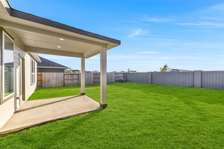 Exterior details and patio area of a home in Sundance Cove - Premier Series, Crosby (Image 26).