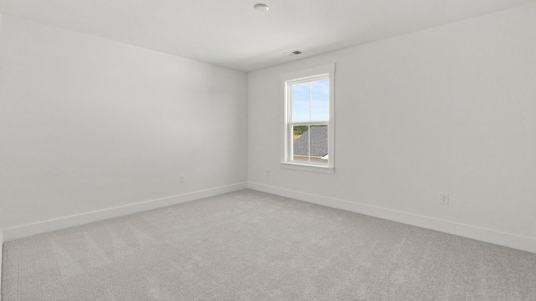 Bedroom 4 provides comfort, privacy, and bright natural light.