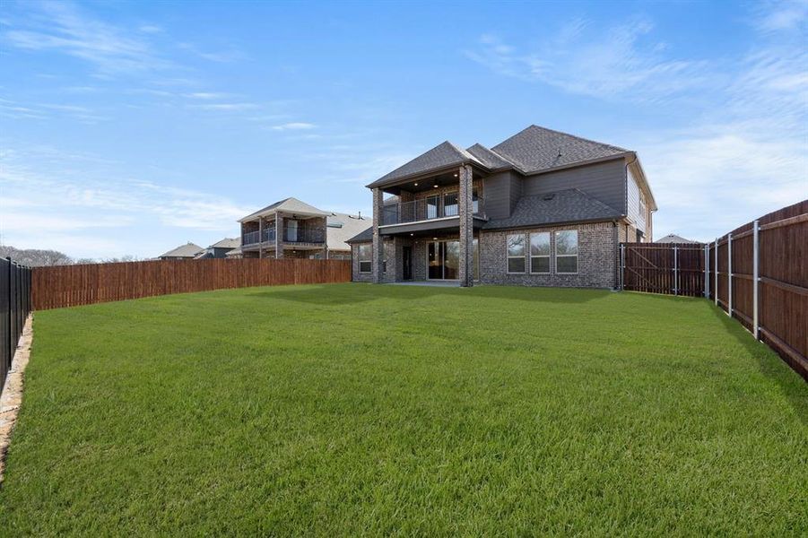 Exterior details and patio area of a home in High Country, Burleson (Image 27).