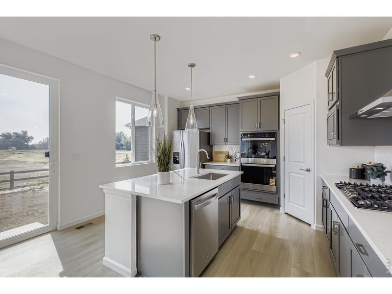 Furnished interior view inside a new home in Country Club Reserve, Fort Collins (Image 31).