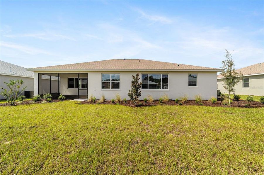Front exterior of a new home in On Top of the World Communities, Ocala, FL, highlighting curb appeal (Image 1). Front exterior of a new home in On Top of the World Communities, Ocala, FL, highlighting curb appeal (Image 1).