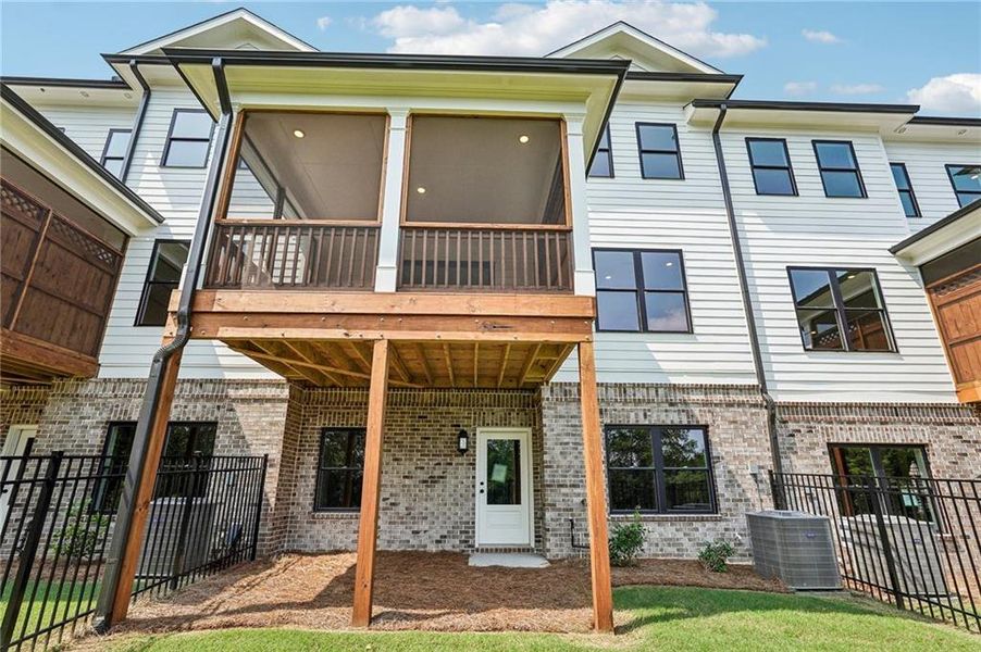 Exterior details and patio area of a home in Millcroft Townhomes, Buford (Image 32).