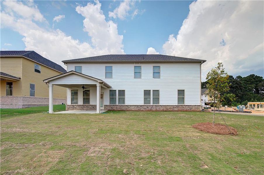 Exterior details and patio area of a home in Adagio, Dacula (Image 22).