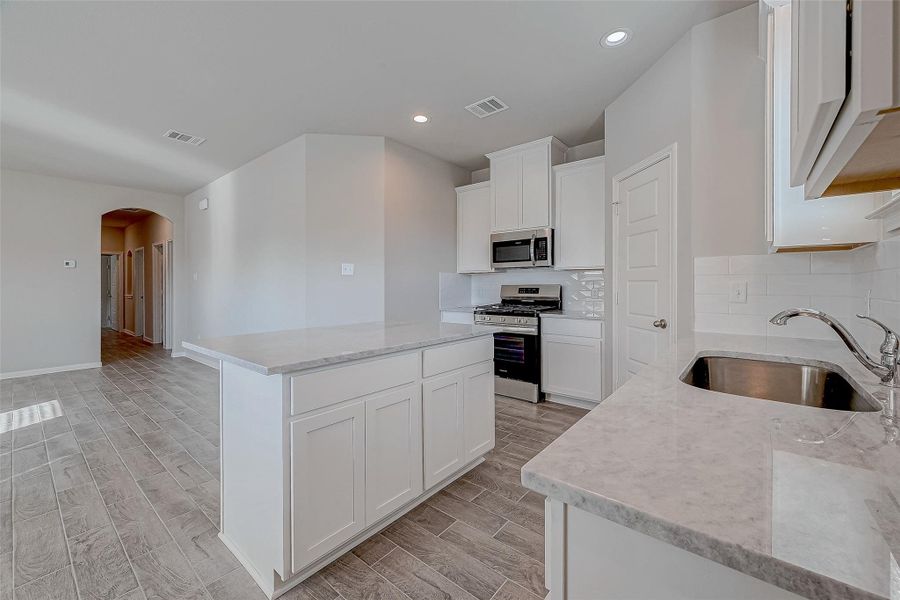 Furnished interior view inside a new home in Mill Creek Trails, Magnolia (Image 9).