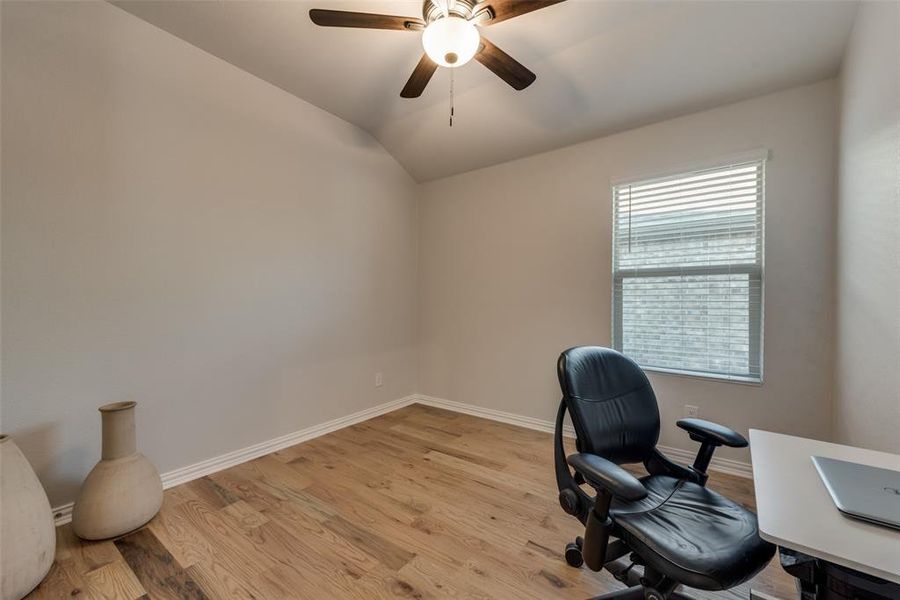Bedroom featuring ceiling fan and light hardwood flooring