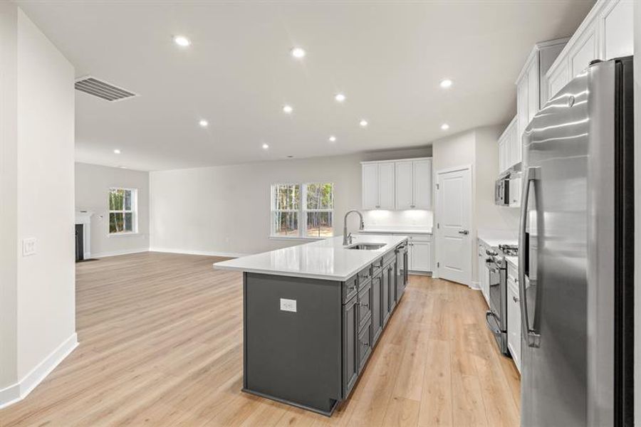 Furnished interior view inside a new home in Lakes at Riverbend Single Family Homes, Navassa (Image 2).