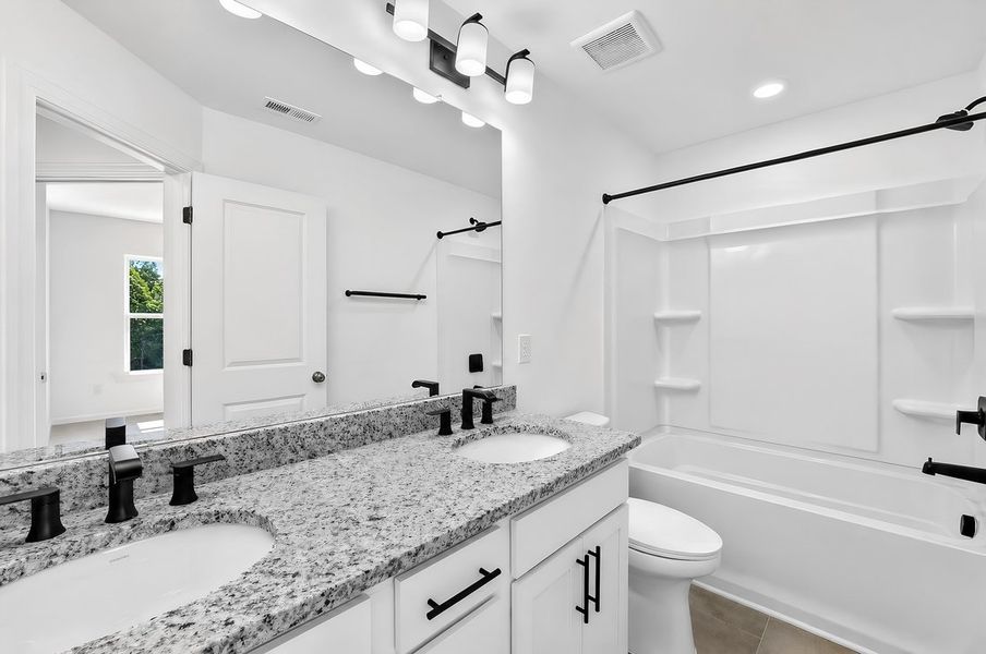 Furnished interior view inside a new home in Silverstone, Knightdale (Image 12).