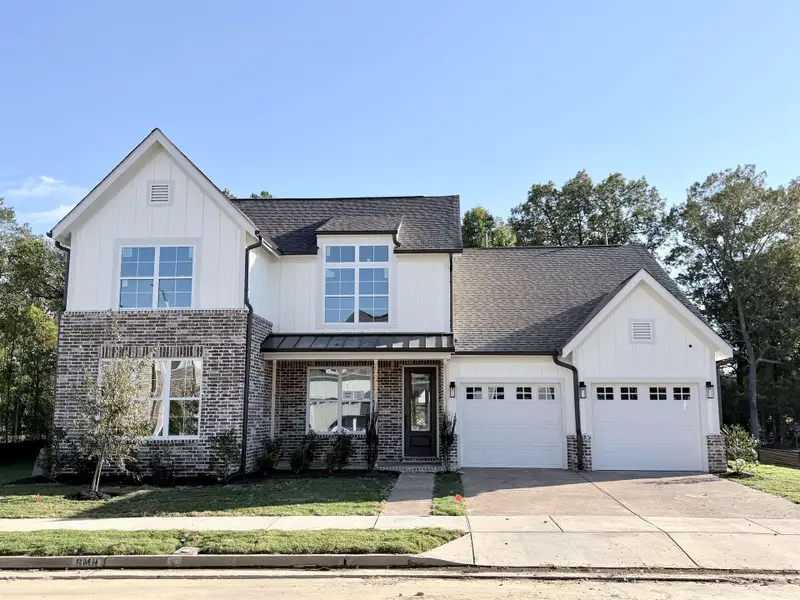 Front exterior of a new home in Lockwood, Collierville, TN, highlighting curb appeal (Image 1). Front exterior of a new home in Lockwood, Collierville, TN, highlighting curb appeal (Image 1).
