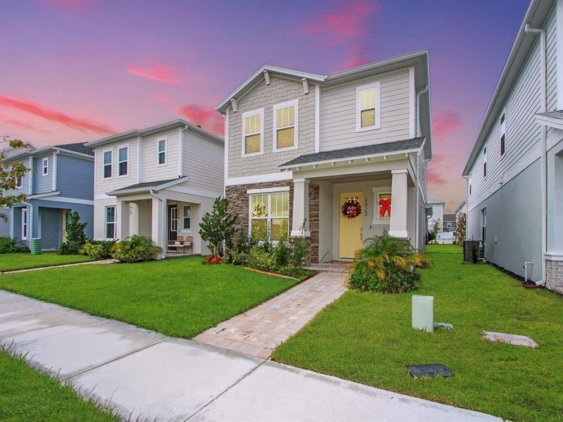 Front exterior of a new home in , St. Cloud, FL, highlighting curb appeal (Image 21).
