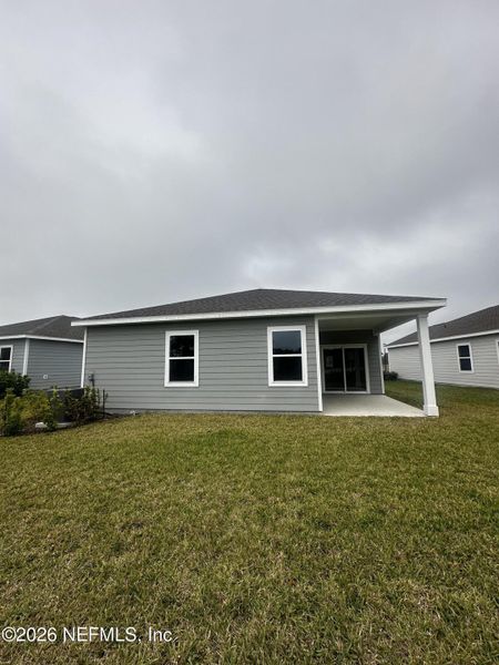 Exterior details and patio area of a home in , Palm Coast (Image 14).