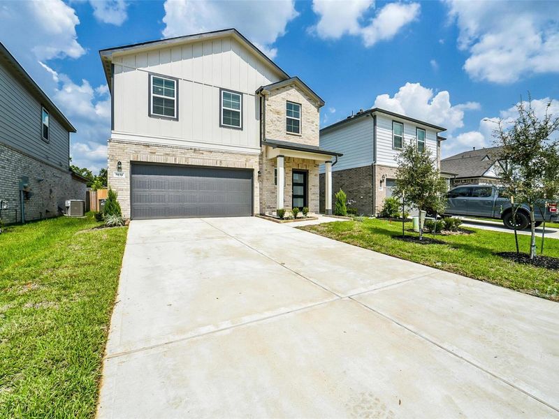 Exterior details and patio area of a home in Lakes at Black Oak, Magnolia (Image 2). Exterior details and patio area of a home in Lakes at Black Oak, Magnolia (Image 2).
