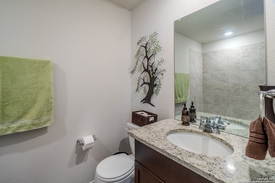 Furnished interior view inside a new home in The Links at River Bend, Floresville (Image 32).