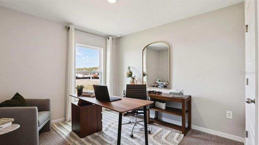 Furnished interior view inside a new home in Lake Deer Estates, Poinciana (Image 24).