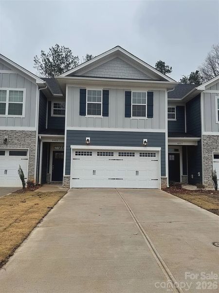 Front exterior of a new home in Pine Trace, Gastonia, NC, highlighting curb appeal (Image 2). Front exterior of a new home in Pine Trace, Gastonia, NC, highlighting curb appeal (Image 2).
