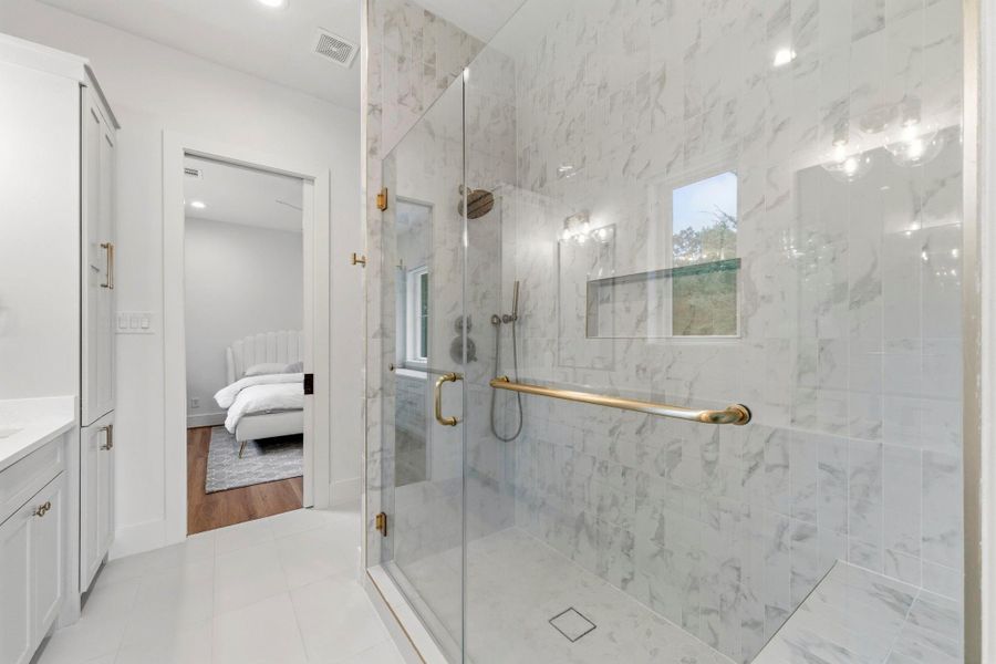 Frameless shower with niche and bench. Frameless shower with niche and bench.