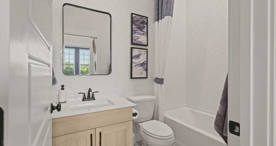 Furnished interior view inside a new home in Stream Waters, Buda (Image 16).