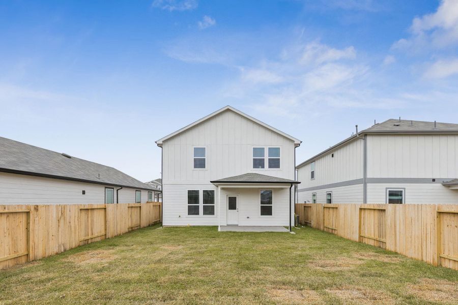 Exterior details and patio area of a home in Decker Farms, Magnolia (Image 2).