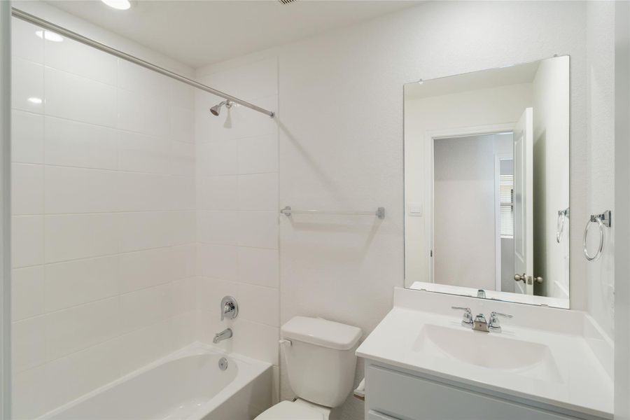 Furnished interior view inside a new home in Prairie Lakes, Buda (Image 6).