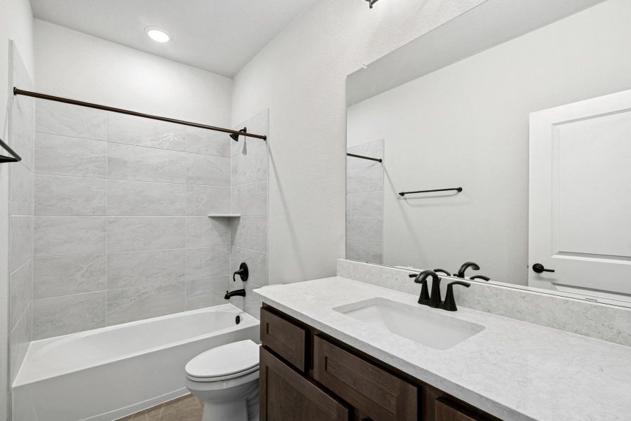 Furnished interior view inside a new home in Harvest Green 45', Richmond (Image 8).