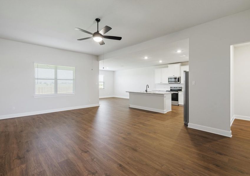 Spacious family room that leads to the kitchen