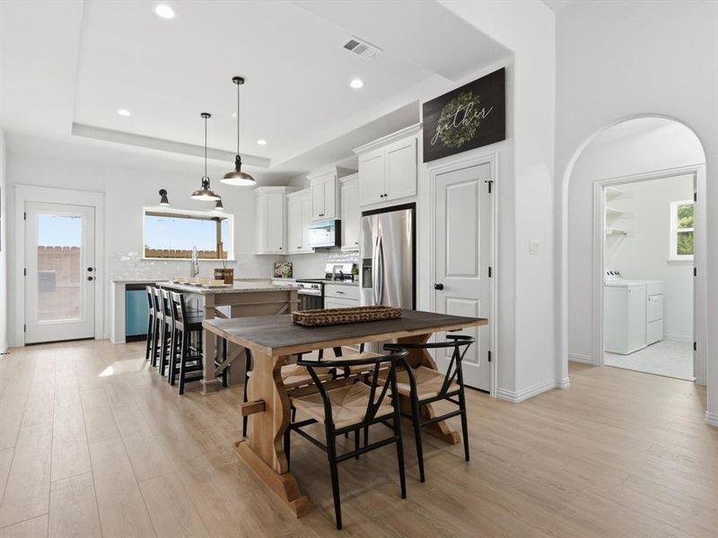 Beautiful flow between the kitchen and dining area.