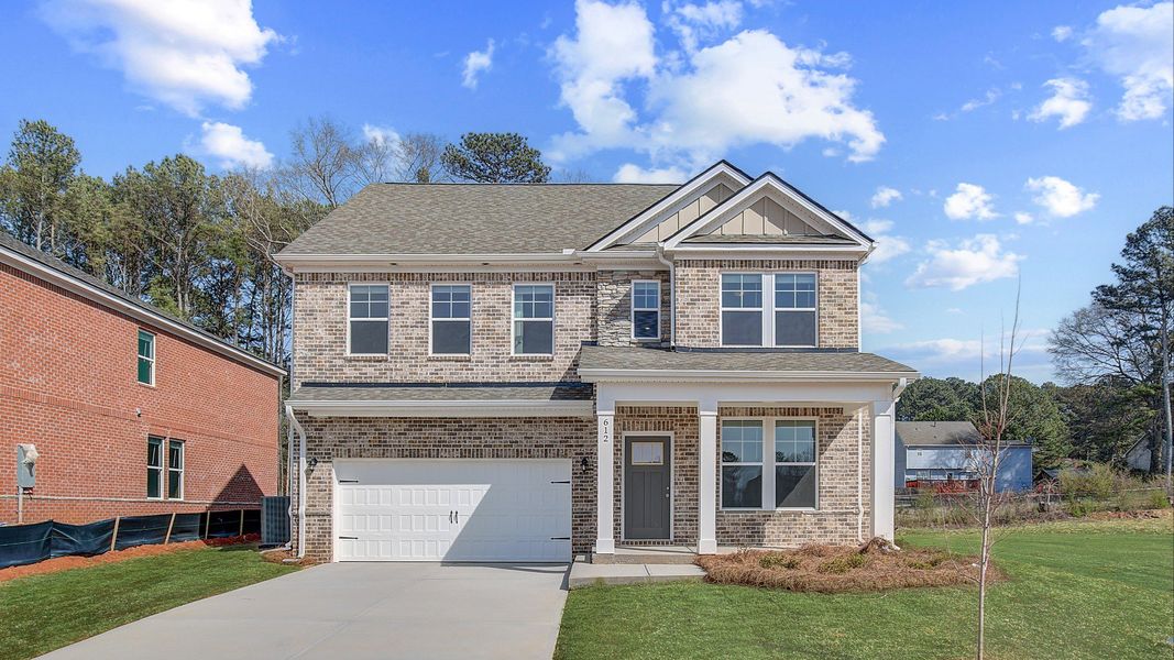 Representative exterior photo of a completed home built from the Pelham by DRB Homes in Bowers Farm, McDonough, GA (Image 22).